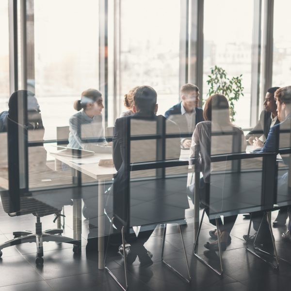 Business people sitting at conference table