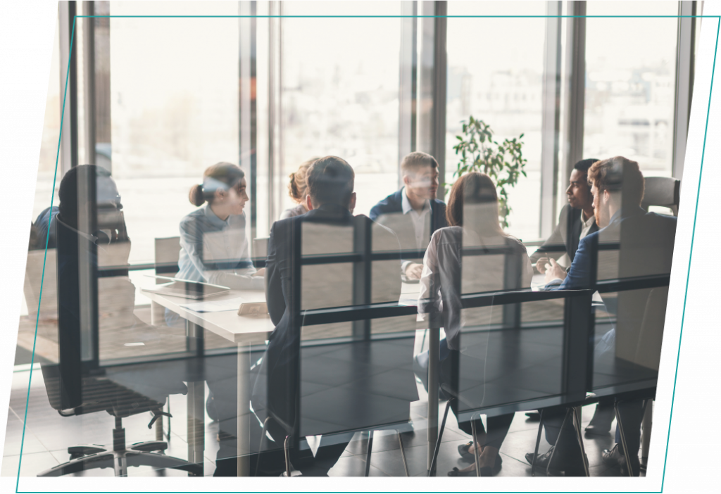 Clients meeting with onboarding team at conference table