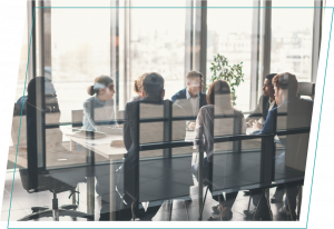 Clients meeting with onboarding team at conference table